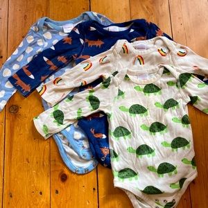 Bundle of four Hannah Anderson long sleeve onesies, size 12-18 mo